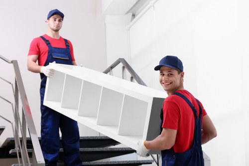 House movers loading furniture for a Sydenham home move