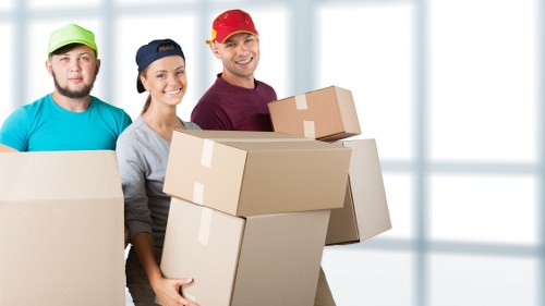 Commercial removals team handling office items in Sydenham