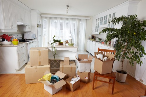 Packed boxes and furniture ready for transport during a local move