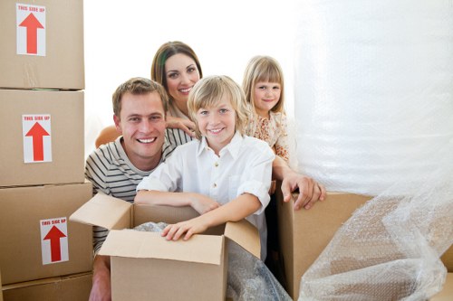 Professional packers organising household items for relocation in Sydenham