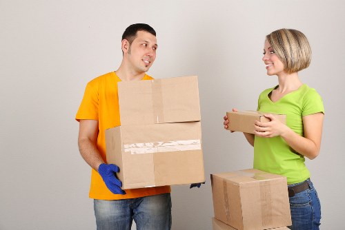 Packed moving boxes and furniture ready for removals in Sydenham