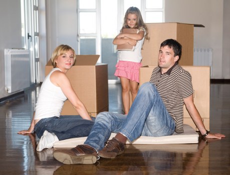 Moving team loading household items for a Sydenham relocation