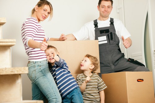 Packed household boxes ready for a local move in Sydenham
